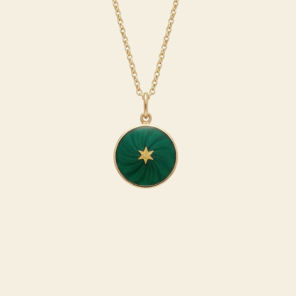 Enamel Guilloché Pendant with a star. One Star Guillouché Pendant. Crafted in 18k yellow gold with translucent guilloché enamel. 15mm diameter. Jewelry Dallas.