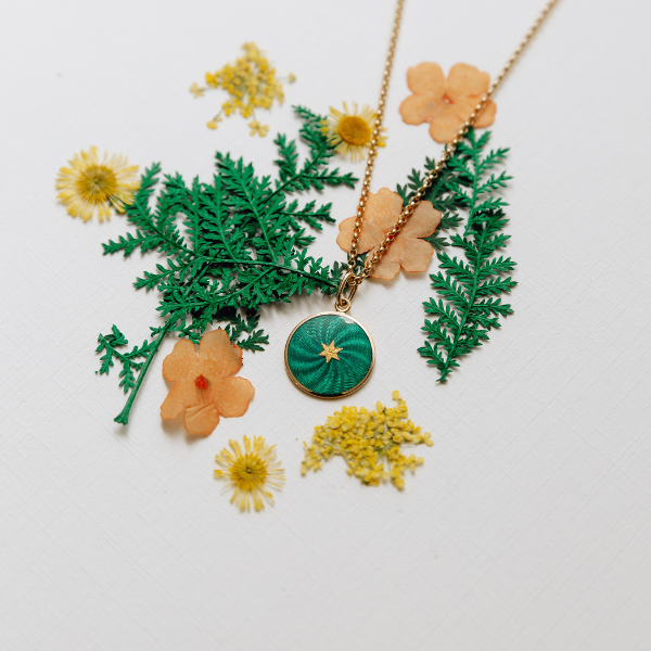 Enamel Guilloché Pendant with a star. One Star Guillouché Pendant. Crafted in 18k yellow gold with translucent guilloché enamel. 15mm diameter. Jewelry Dallas.