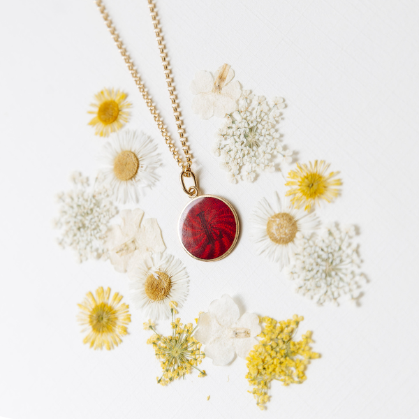 Initial Guilloché Pendant. Crafted in 18k yellow gold with translucent guilloché enamel. 15mm diameter. Jewelry Dallas.