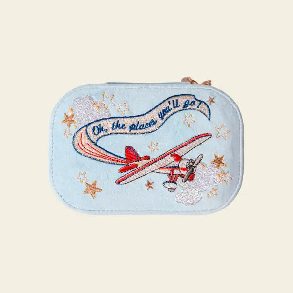 Embroidered velvet blue travel jewelry box with airplane design and 'Oh, the places you'll go' text.  Bon Voyage Light Blue Velvet Embroidered Travel Jewelry Box. Jewelry Dallas.