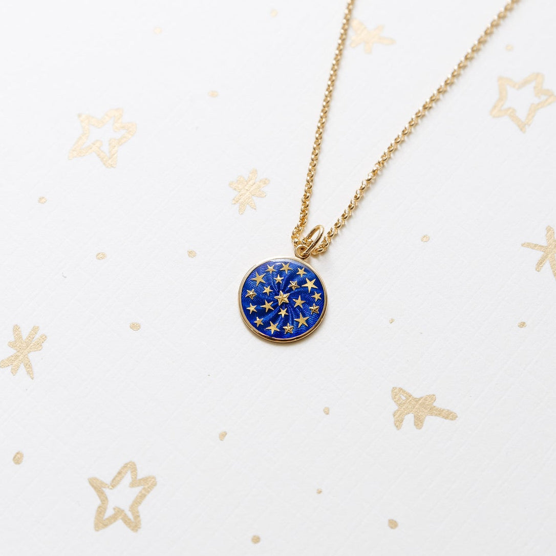 Star Field Guilloché Pendant. Crafted in 18k yellow gold. 15mm diameter. Jewelry Dallas.