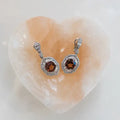 Pair of earrings with pink tourmalines and diamonds on a heart-shaped gemstone. Pink Tourmaline Hexagon Drop Earrings with Diamonds. 9.10 carats of vibrant hexagon-cut pink tourmalines, accented by 2.84 carats of brilliant diamonds, set in 18k white gold. Jewelry Dallas.